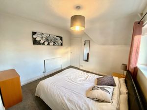 Bedroom One- click for photo gallery